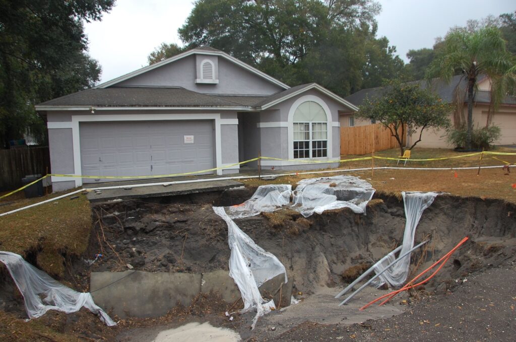cases of sinkholes under houses and their impact